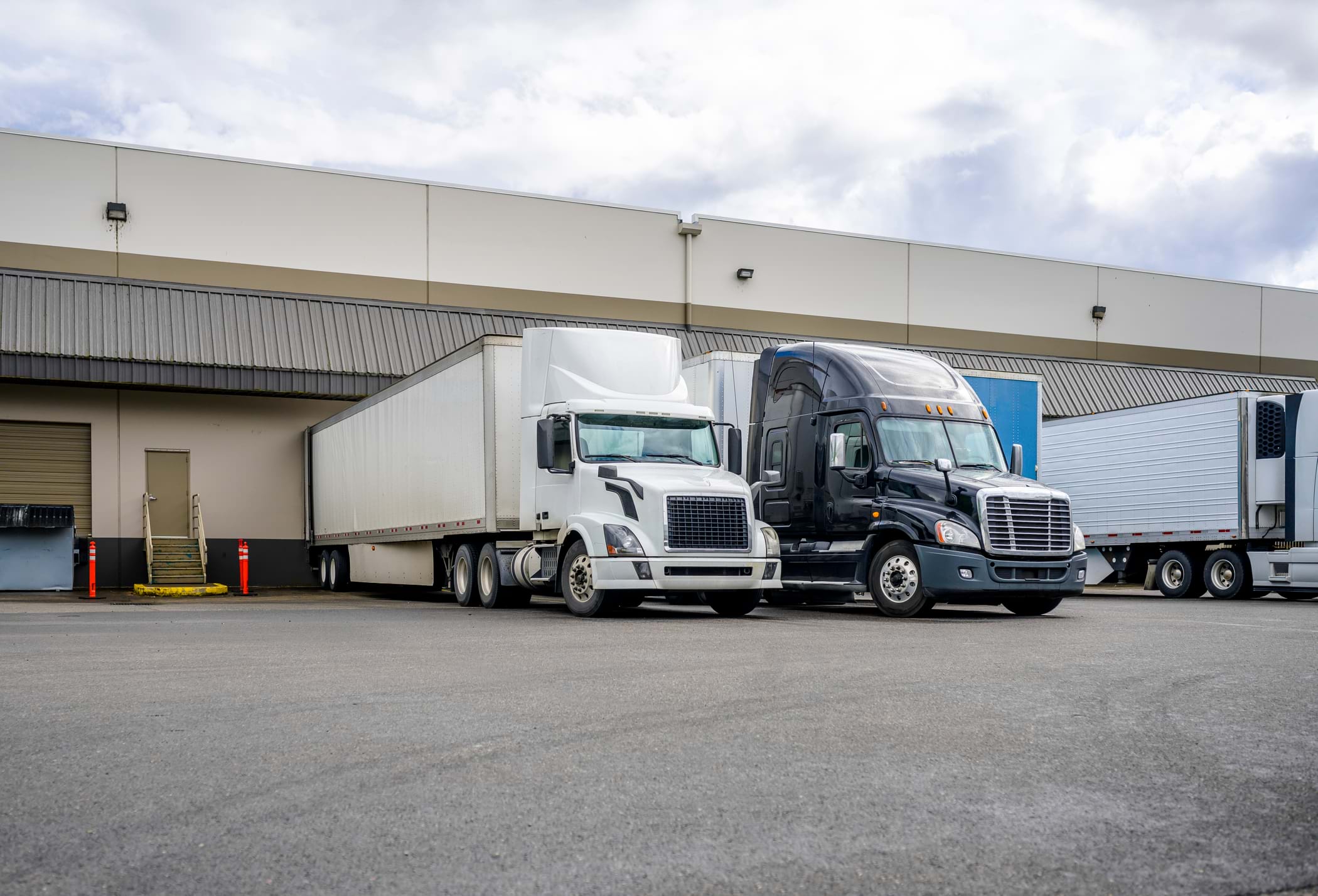 Semi trucks in front of loading dock
