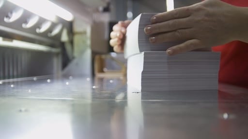 stack of printed postcards